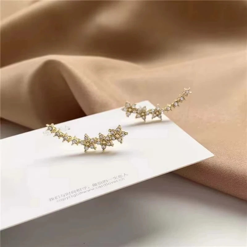 Pendientes Trepadores de Flor y Estrella con Circonitas