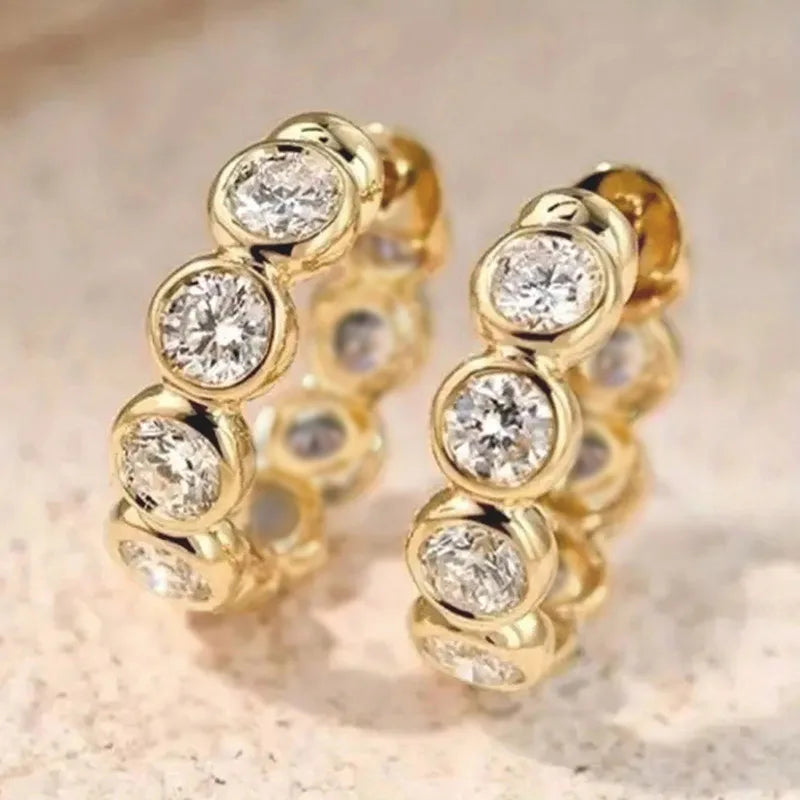 Set Brillo: Aros Finos con Circonitas + Anillo Solitario