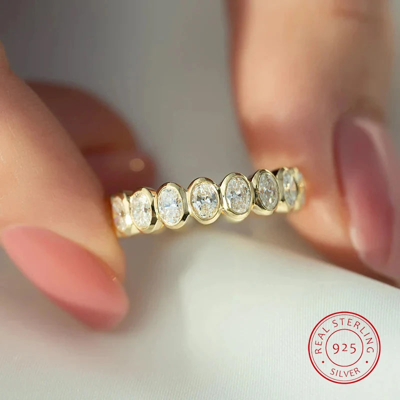 Set Fiesta: Anillo de Eternidad Oval + Aros Entrelazados