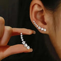 Pendientes Trepadores de Flor y Estrella con Circonitas