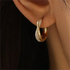 Pendientes de Aros Entrelazados con Circonitas